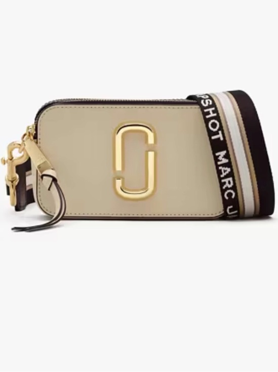Marc Jacobs Handbags - Marc Jacobs Snapshot bag features cream-colored Saffiano leather and gold-tone